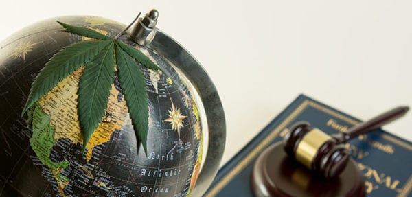 Globe with cannabis leaf