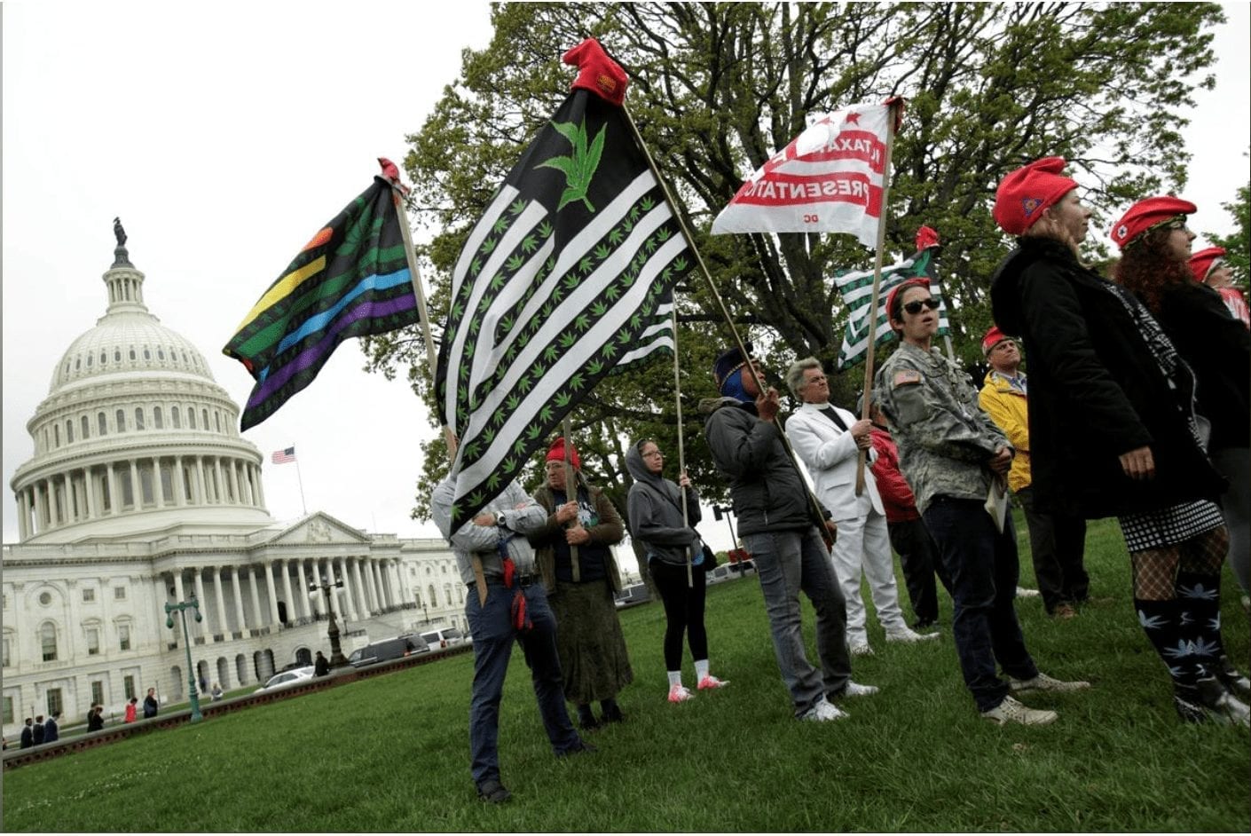 FILE PHOTO: Protesters gather to smoke marijuana on steps of the U.S. Capitol to tell Congress to "De-schedule Cannabis Now", in Washington, U.S. April 24, 2017. REUTERS/Yuri Gripas/File Photo